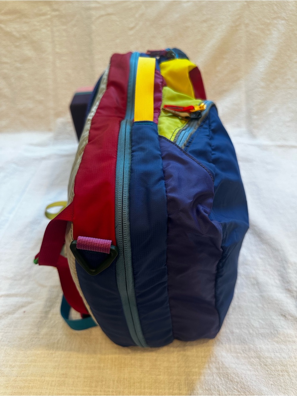 cotopaxi colorblock backpack in blue, red, and yellow - Picture 4 of 5